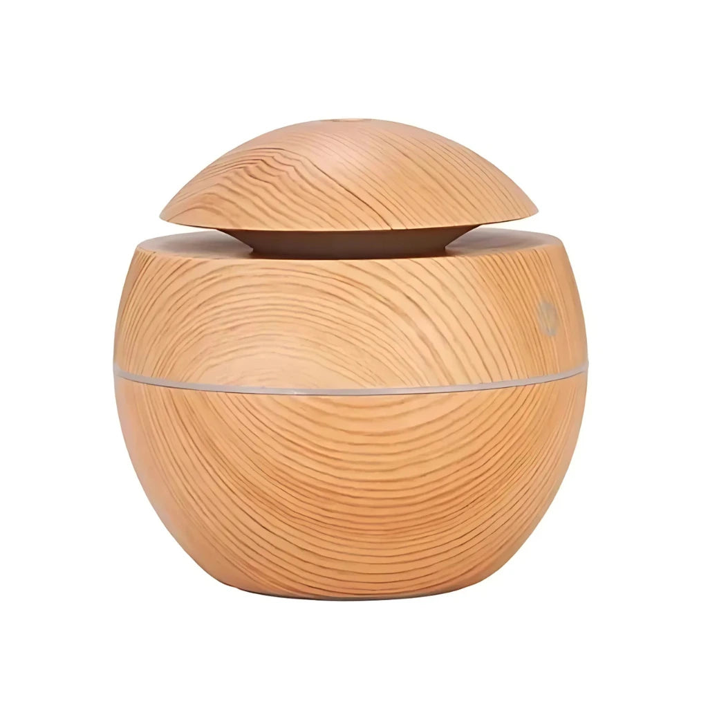 Wooden diffuser with a lid on a white background